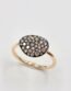 Bague en or rose 750/000ème avec motif galet pavé de diamants ronds