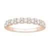 Alliance en or 750 sertie de diamants avec motif floral symétrique