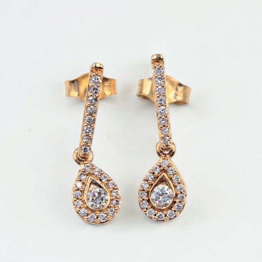BOUCLES D oreilles diamants sur or rose